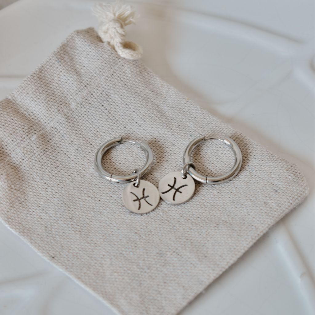 Aros Zaniah | Signo zodiacal