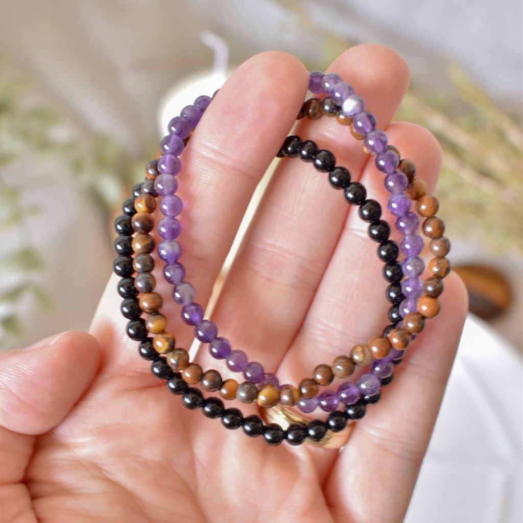 Trío de Pulseras para Protección y Equilibrio | Amatista, Ojo de Tigre y Ónix
