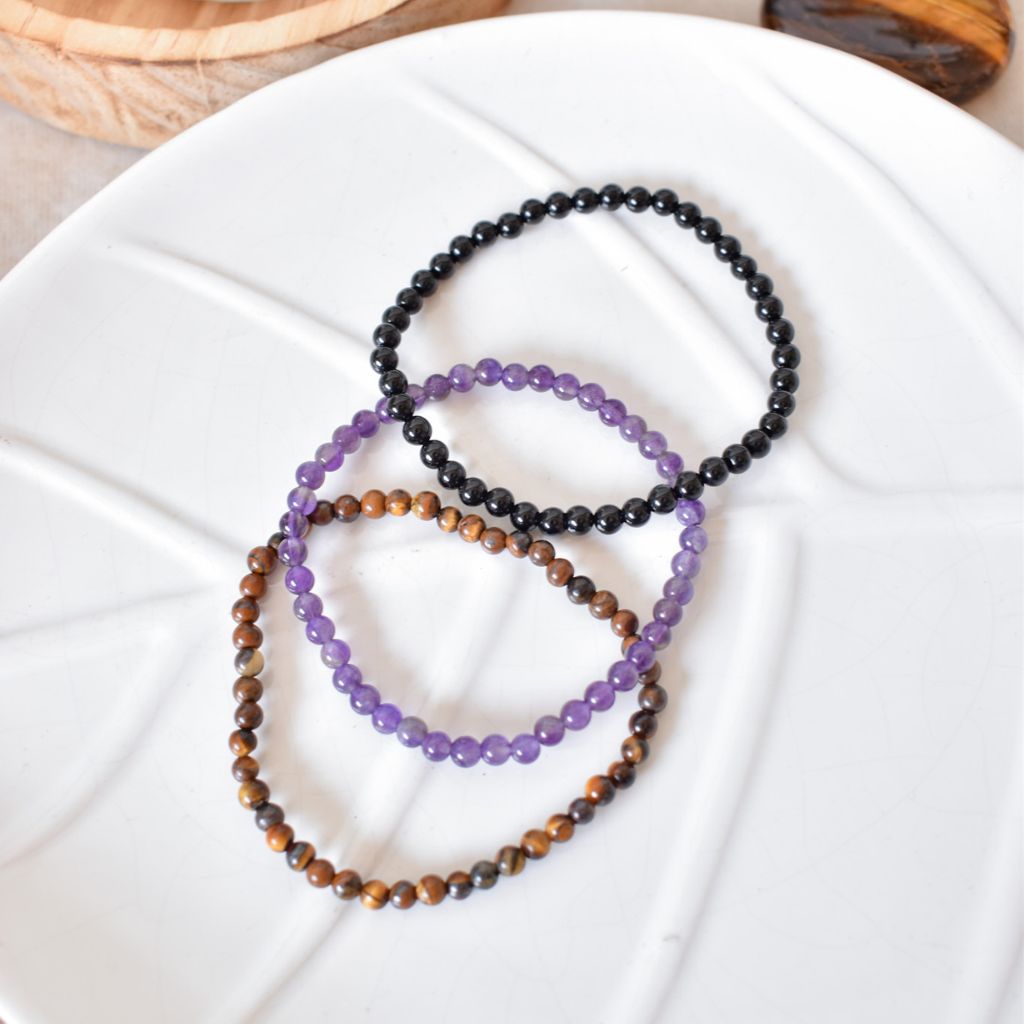 Trío de Pulseras para Protección y Equilibrio | Amatista, Ojo de Tigre y Ónix