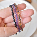 Trío de Pulseras para Protección y Equilibrio | Amatista, Ojo de Tigre y Ónix